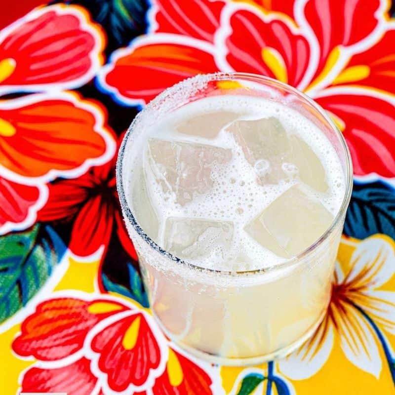 A margarita from Lolo on a colorful floral tablecloth