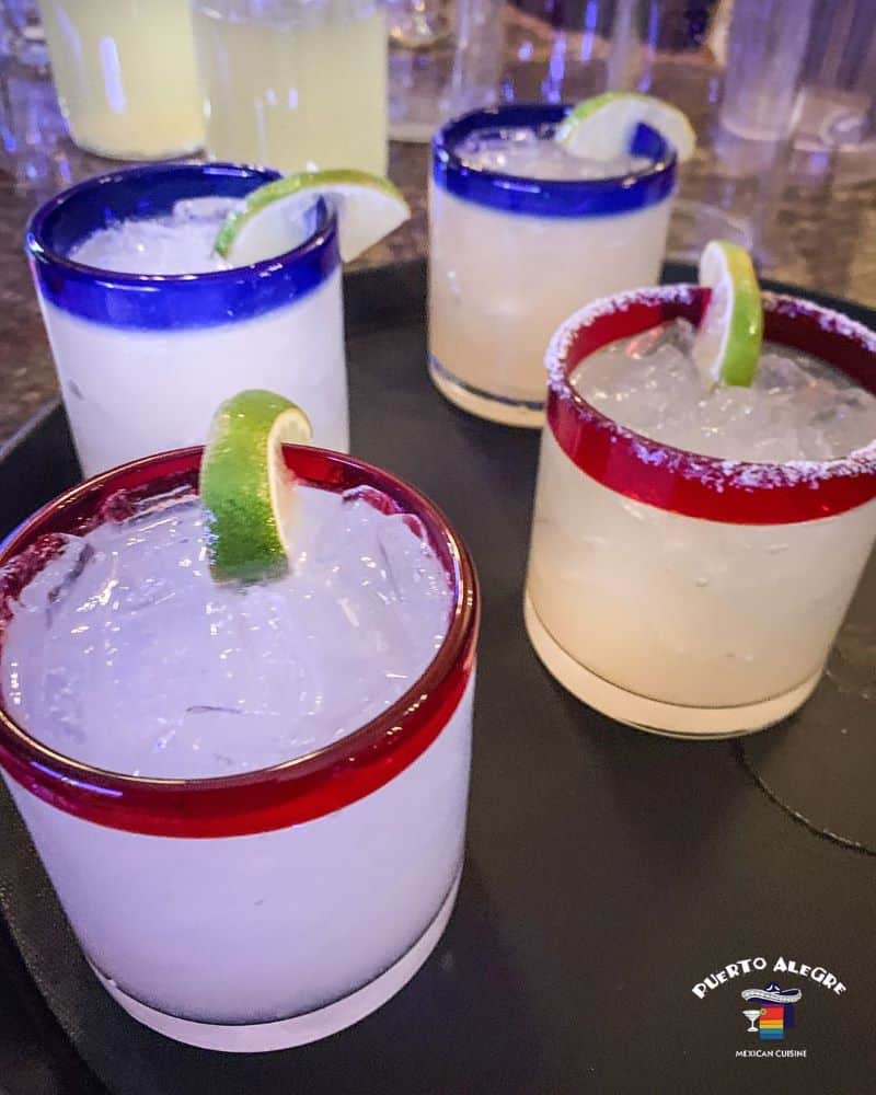 4 margaritas with colorful rimmed glasses from Puerto Alegre.