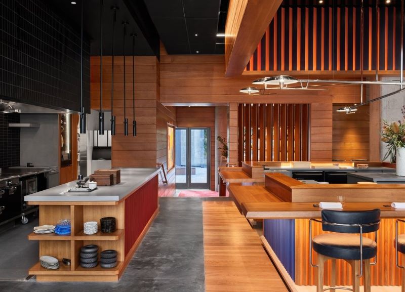 Interior of Akiko's restaurant with warm wood paneling and sleek design