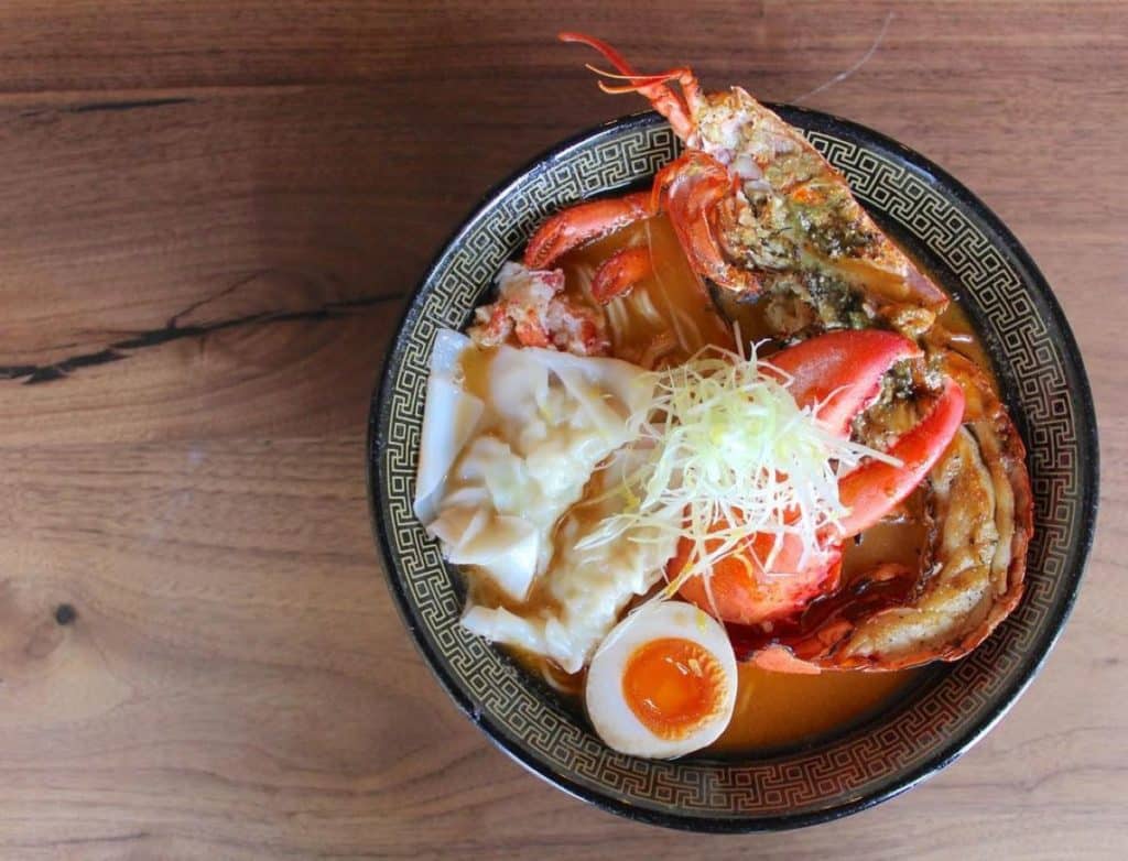 A bowl of seafood ramen from above.