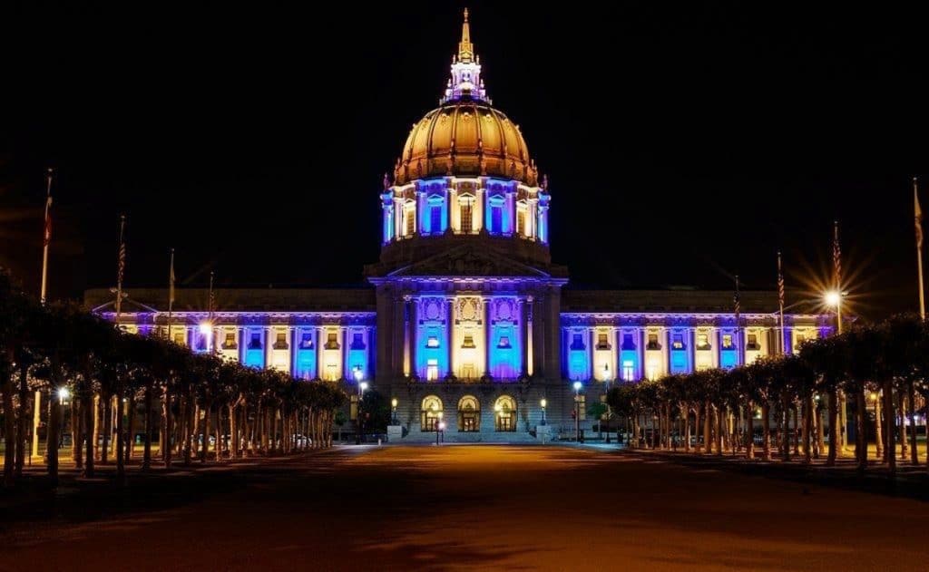 SF City Hall lit up with blue and yellow, colors of the Ukrainian flag.