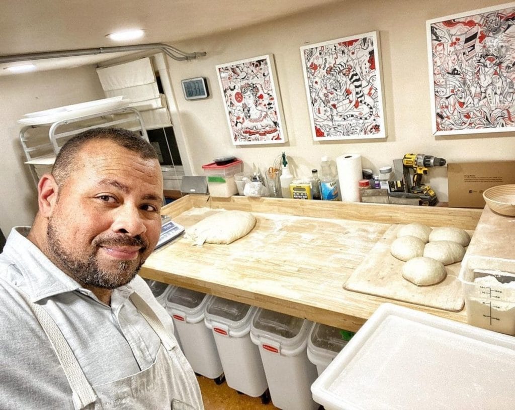 Azikiwee Anderson of Rize Up Bakery prepares his popular sourdough bread.