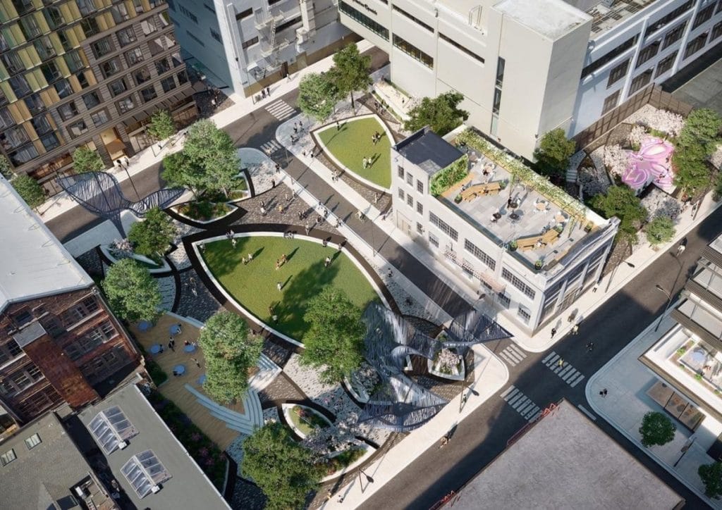 View of 5M from above, depicting expansive grassy spaces and a rooftop terrace.