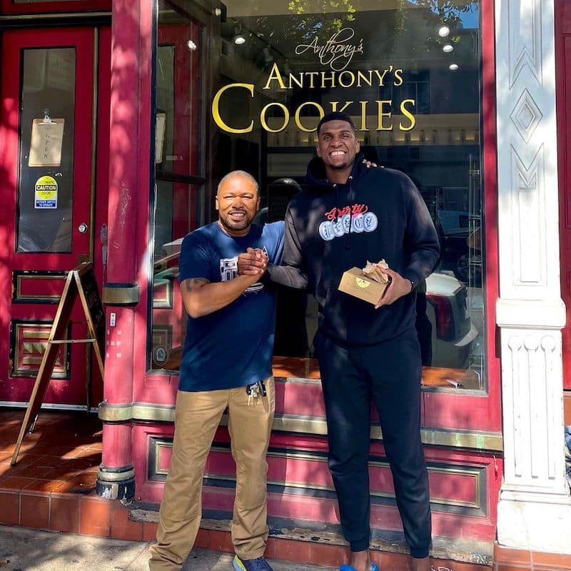 Anthony of Anthony's Cookies with The Warriors Kevon Looney