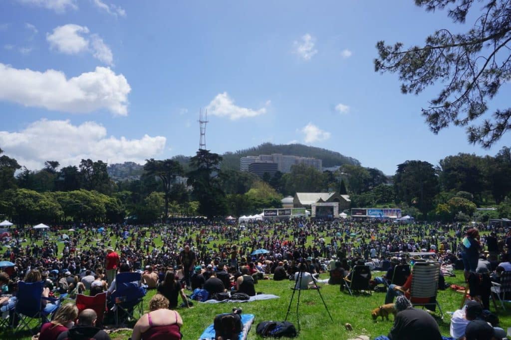 Thousands of people celebrate 420 on a field in Golden Gate Park.