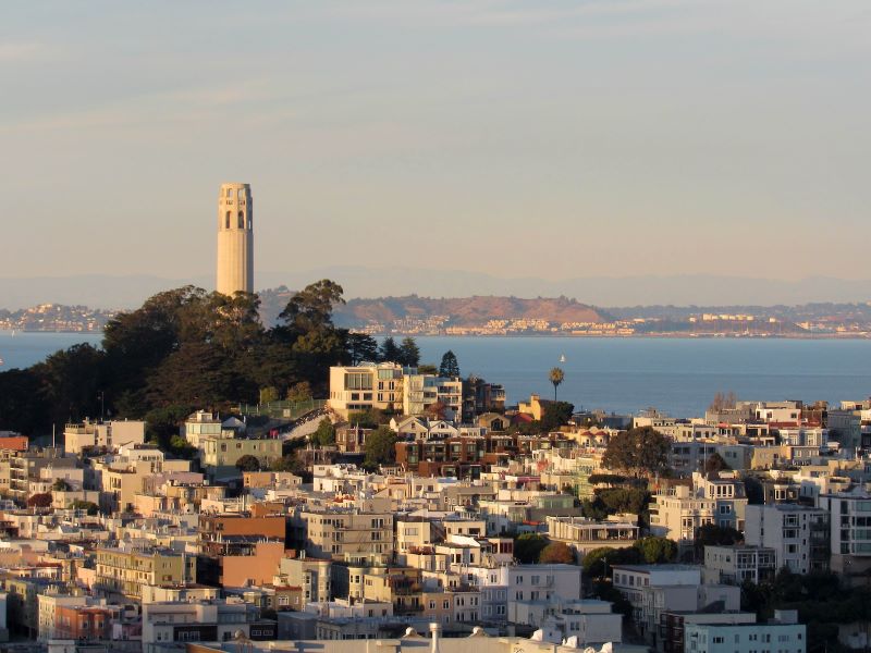 Coit Tower rises above Telegraph Hill in San Francisco.