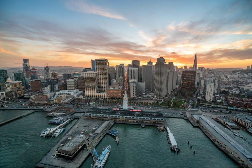 San Francisco waterfront with Ferry Building at sunset.