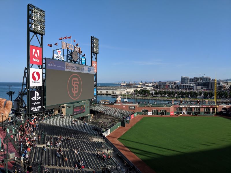 Crowds watch a baseball game at Oracle Park in SF.
