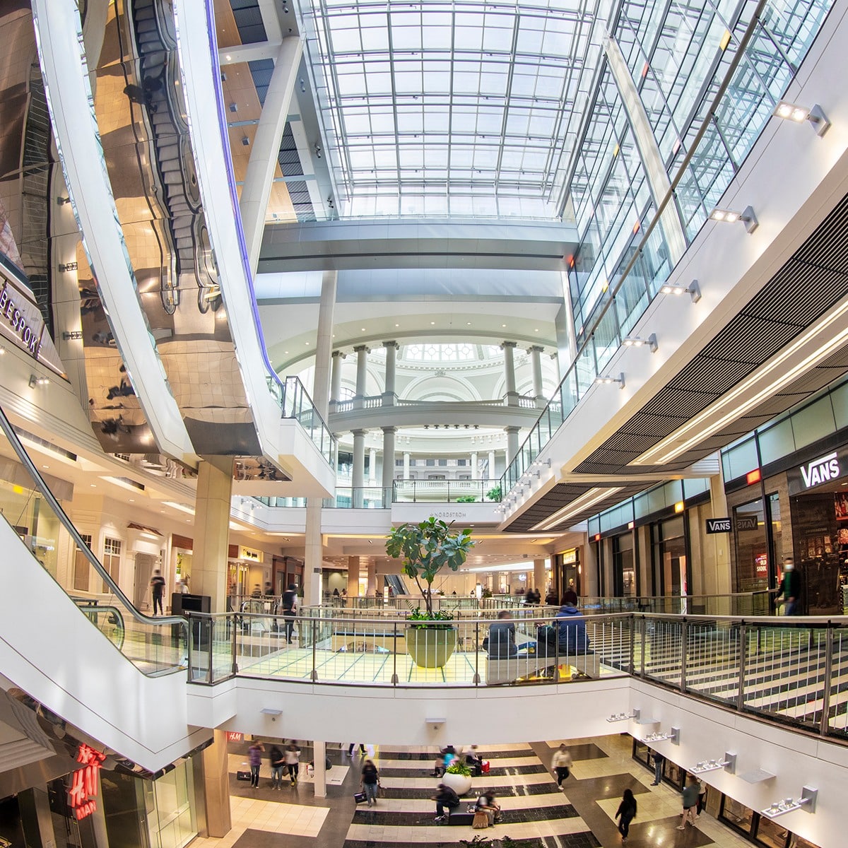 Interior of Westfield SF Centre mall with a large skylight and multiple floors lined with stores.