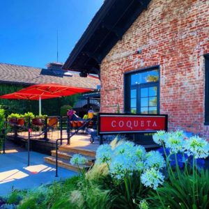 Flowers and patio outside SF's beloved Spanish restaurant Coqueta