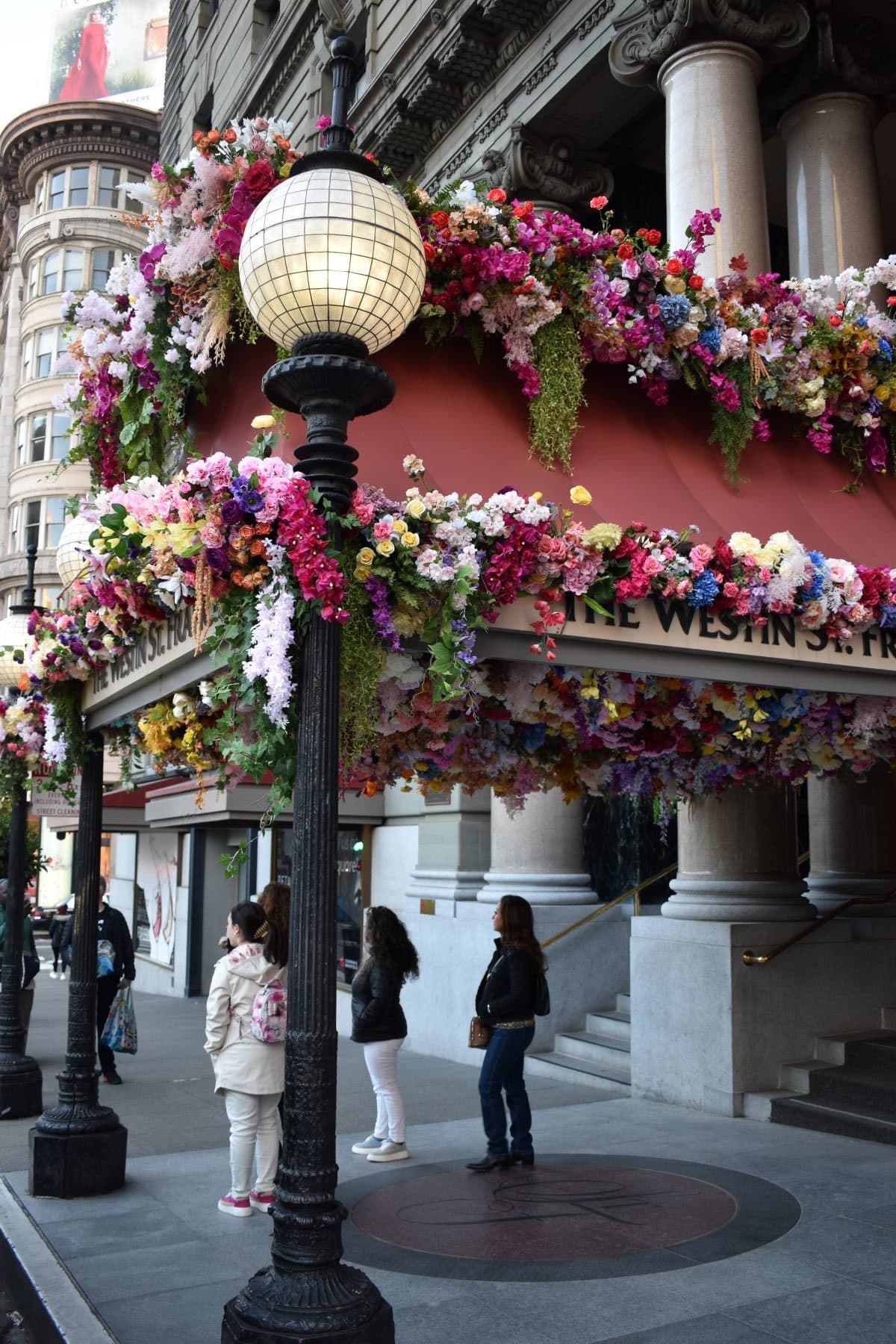 Flower display decorating exterior of Westin St. Francis hotel in San Francisco
