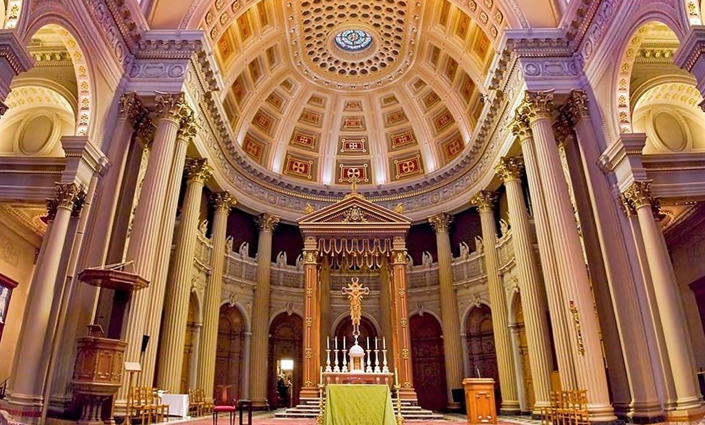 The dome-shaped ceiling inside St Ignatius Church in San Francisco