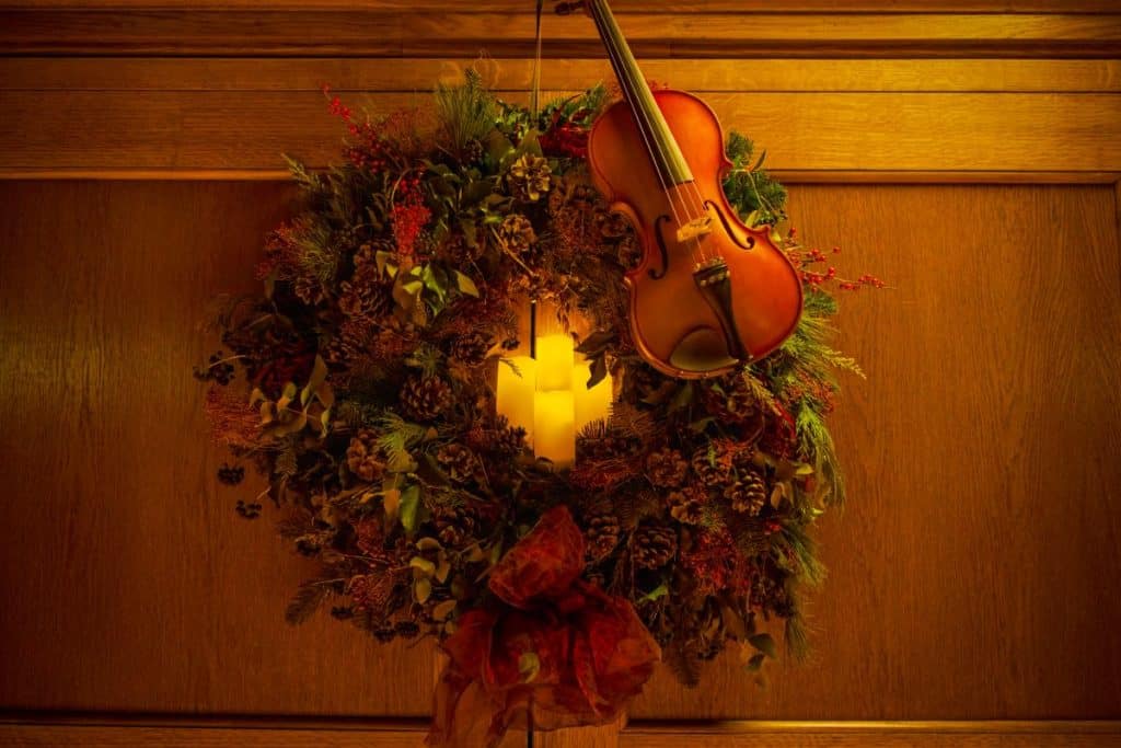 A Christmas wreath on display for a Candlelight holiday special.