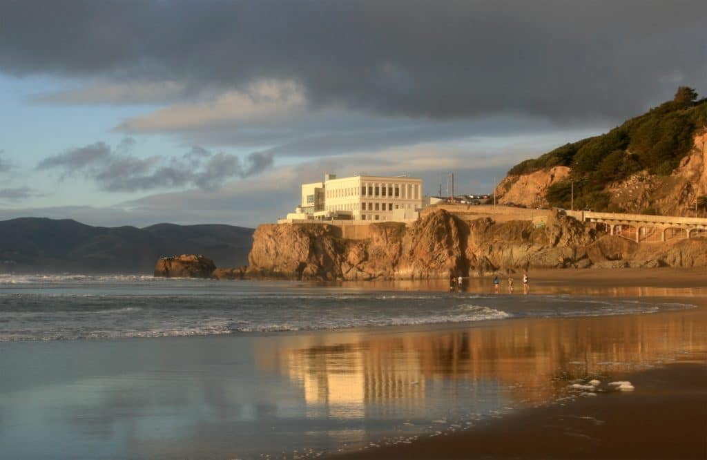 cliff house from ocean beach at sunset