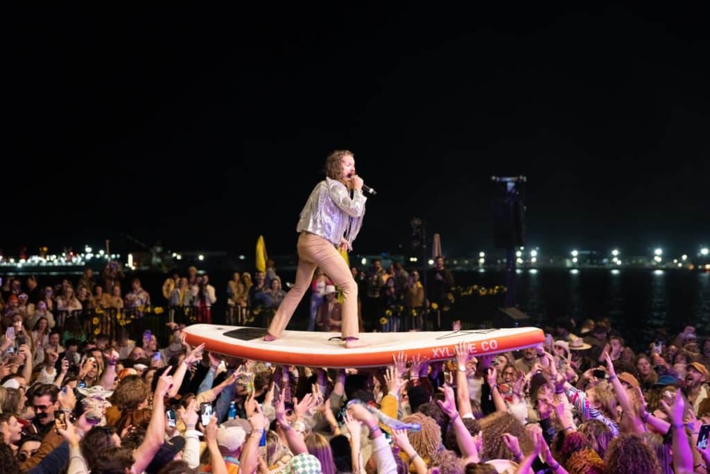 crowd surfing at the mustache bash