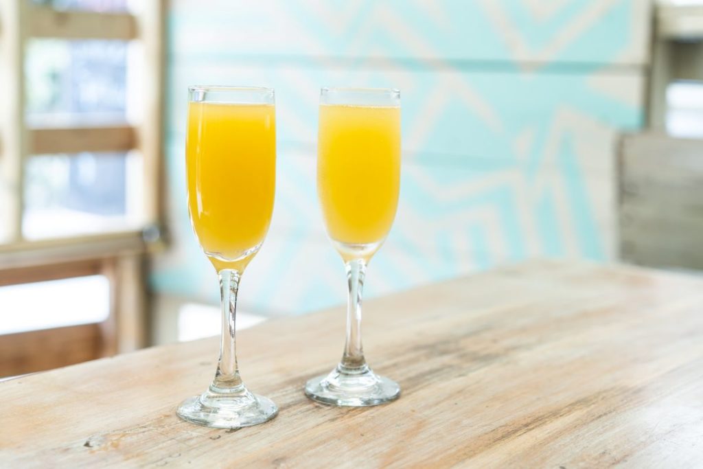 Two mimosas on a table