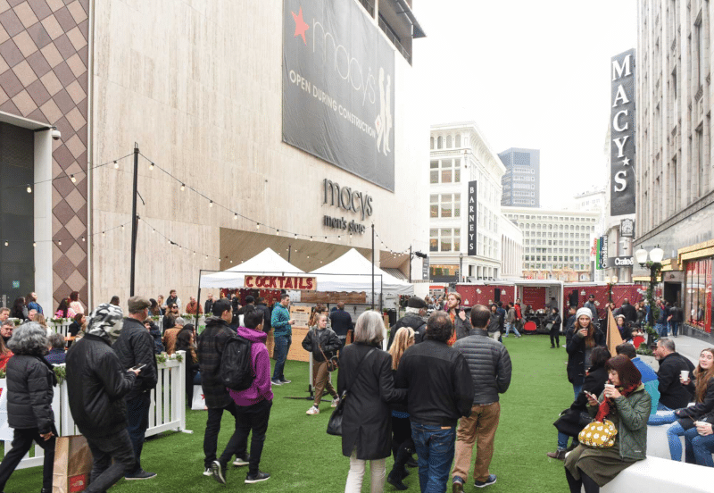 People visit holiday vendors at Union Square Winter Walk